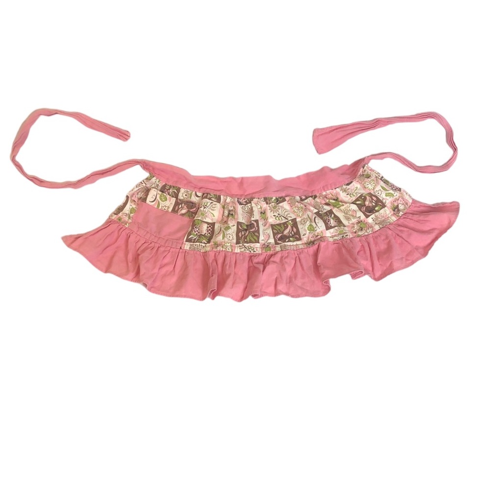Cute as all get-out vintage child's pink apron with li’l pocket